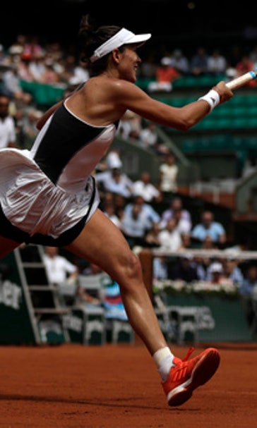 The Latest: Defending champion Djokovic into quarterfinals